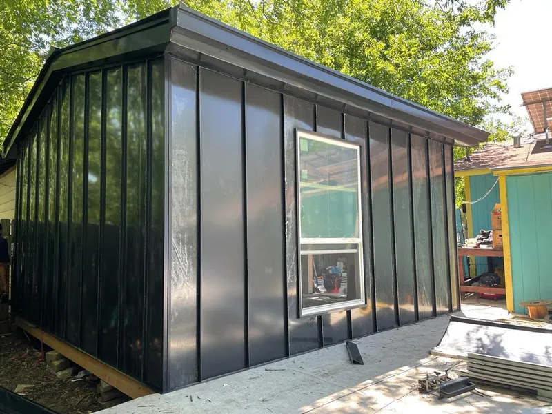 Black standing seam metal wall panels for Metal Roof Installation in Chardon